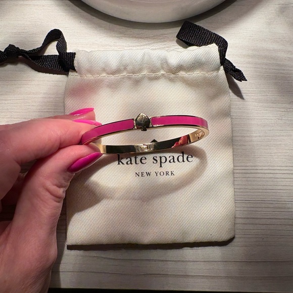 kate spade Jewelry - Kate Spade Gold and Pink Enamel bangle bracelet with spade clasp- Preowned